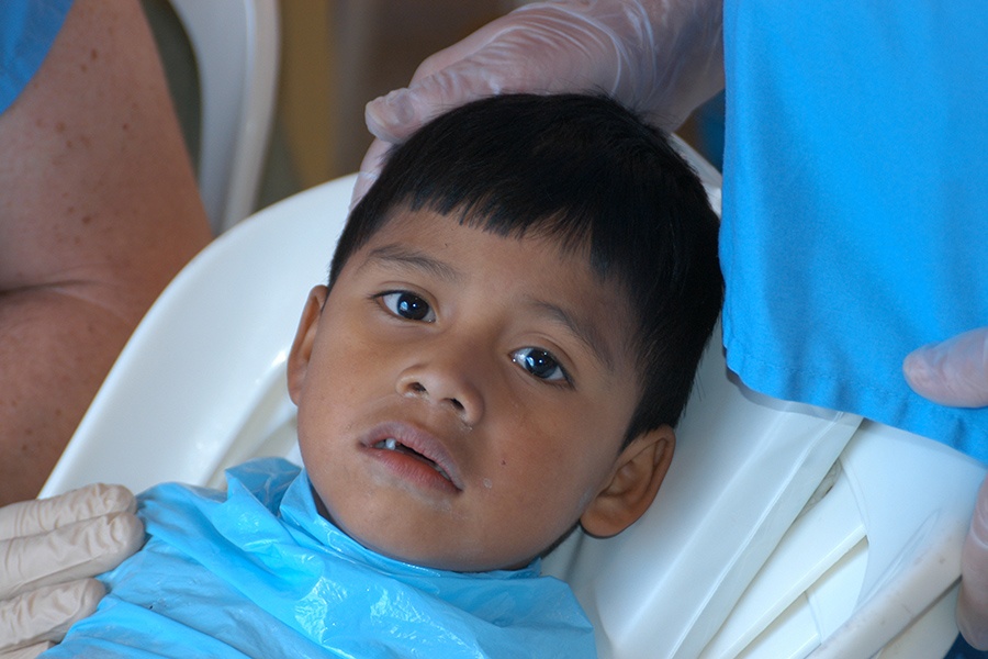 Young dental patient receiving treatment