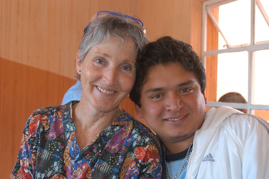 Smiling dental team member and patient