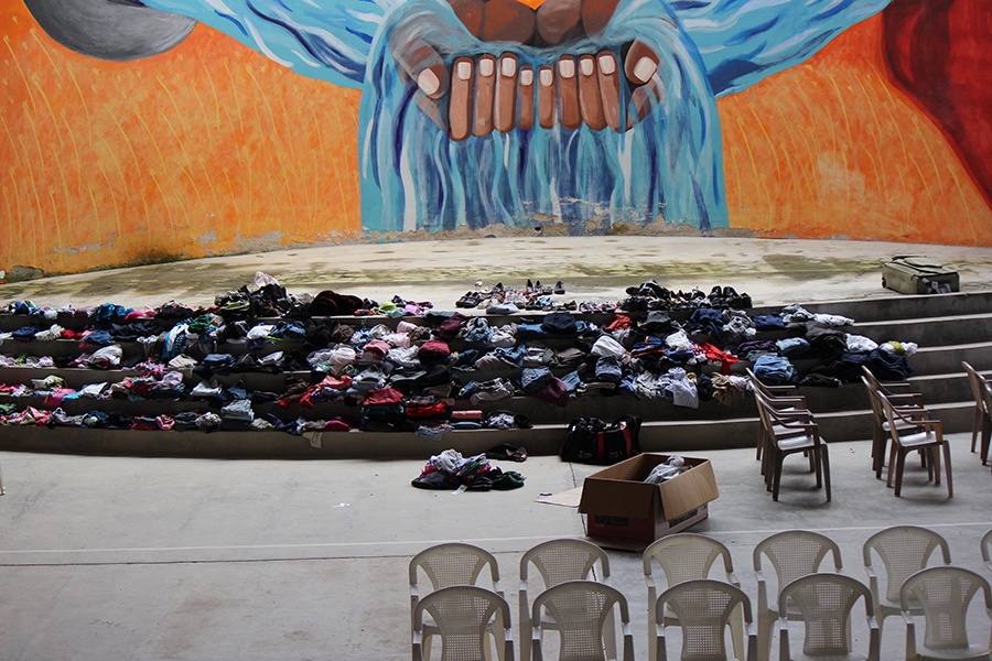 Donated items in front of a mural