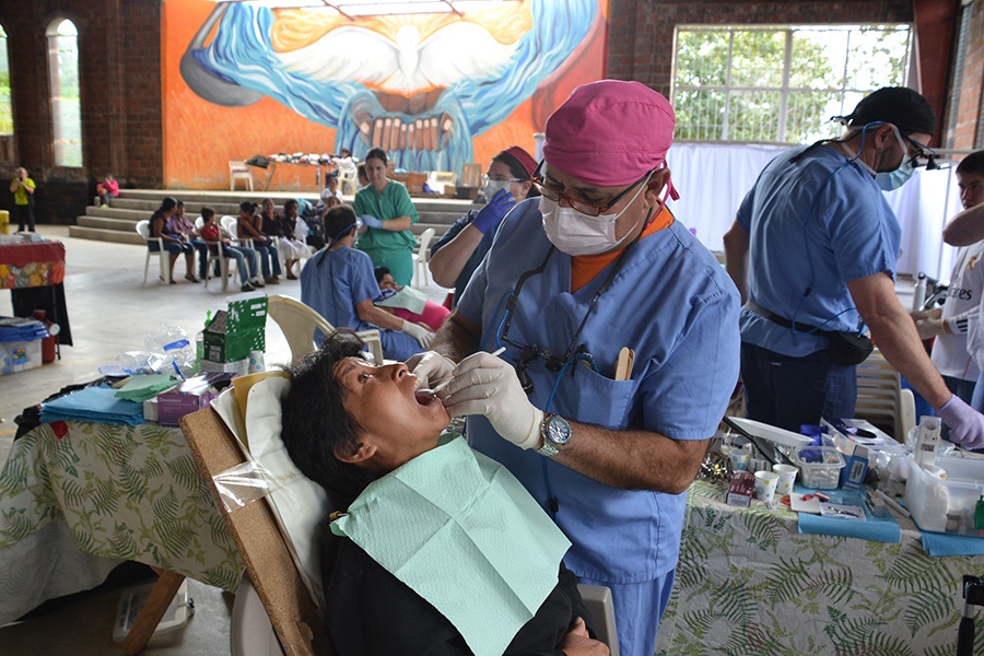 Dentist examining dental patient