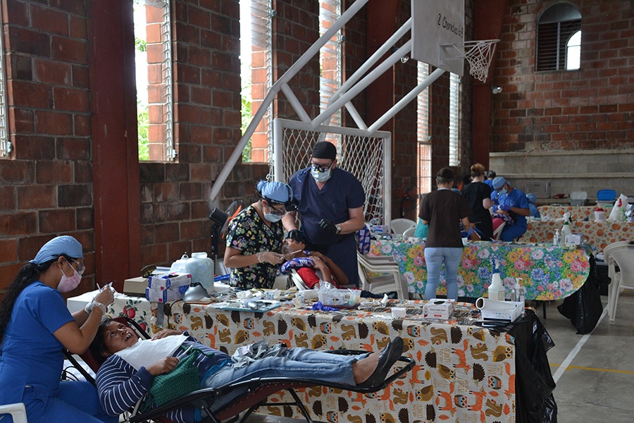 Row of patients receiving dental care