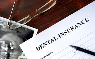 Dental insurance form resting on a table