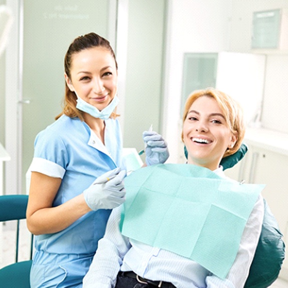 Woman undergoing dental checkup in Glastonbury
