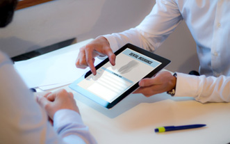 Patient reviewing dental insurance on tablet