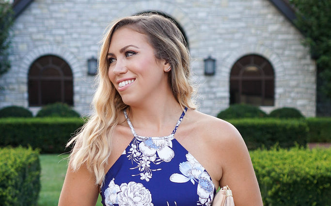 person with white teeth smiling at wedding