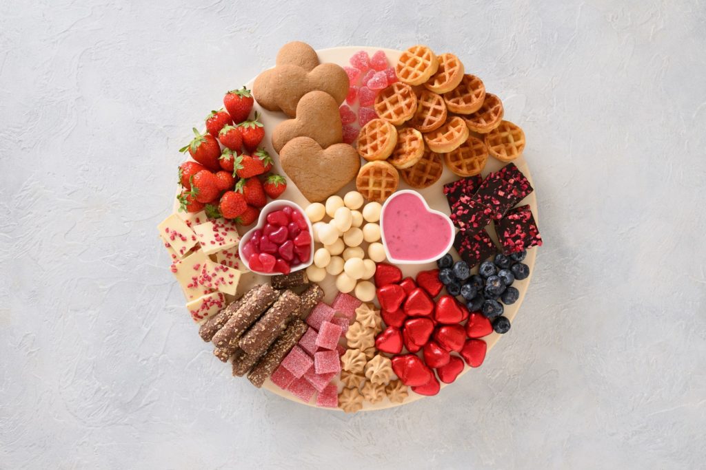 Assortment of Valentine's Day treats on cutting board